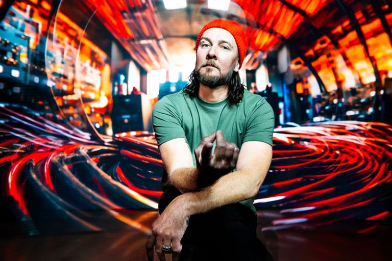 Authority Zero frontman Jason DeVore debuts sun-soaked new single ‘I’m On A Beach’