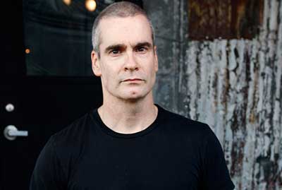 Henry Rollins Decorates A Gingerbread House