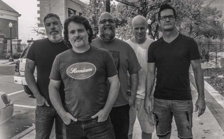 Slap Of Reality sign with A Jam Records